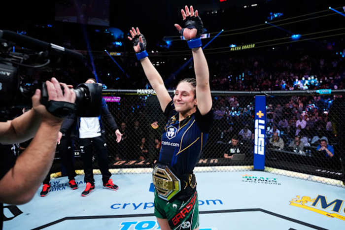 Alexa Grasso celebrates her UFC Women's Flyweight Championship victory.